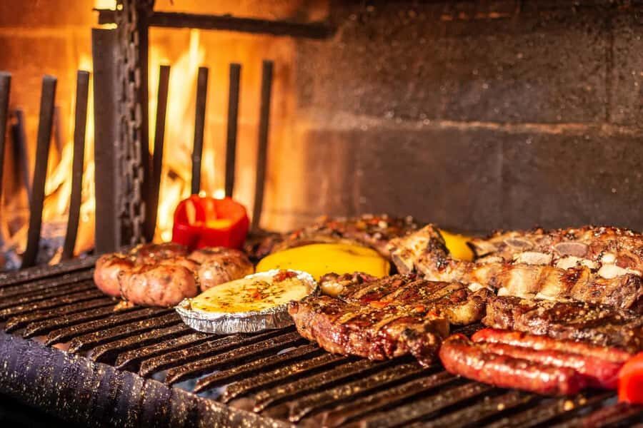 Secrets of Asado in Buenos Asado, BBQ and Dinner - Provoleta, Cheese Tasting, and White Wine to Set the Stage
